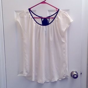 Cream blouse with black neck tie